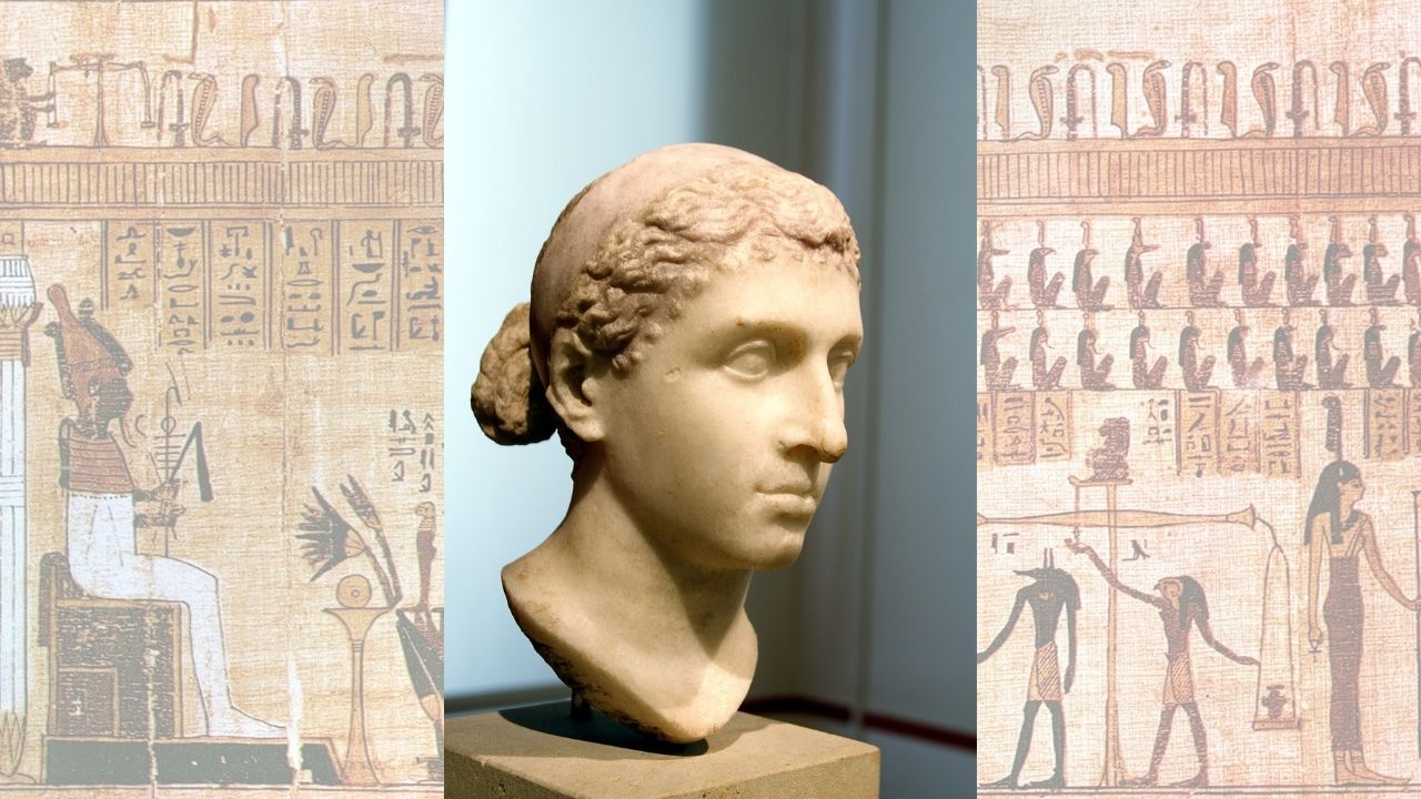 Cleopatra's head in statue form over an image of hieroglyphics.