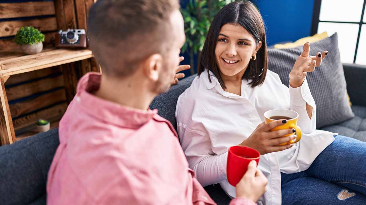 Couple coming back together with a cup of tea and moving forward.