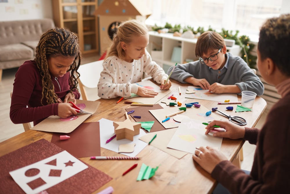 Multi-ethnic,Group,Of,Children,Making,Handmade,Christmas,Cards,Together,While