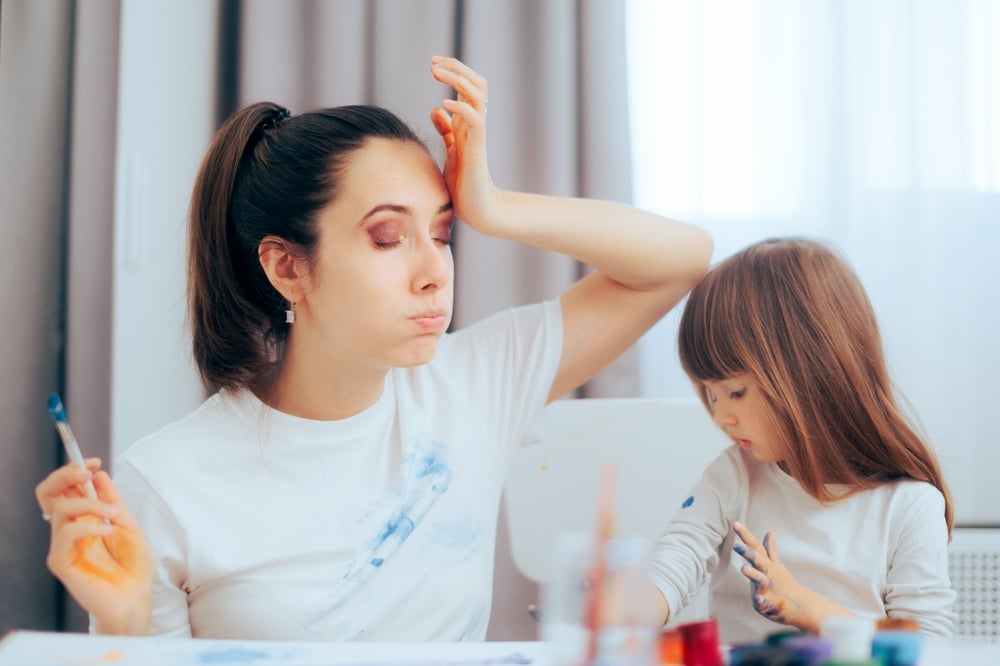 Mom,And,Daughter,Getting,Paint,All,Over,Their,Clothes.,Stressed